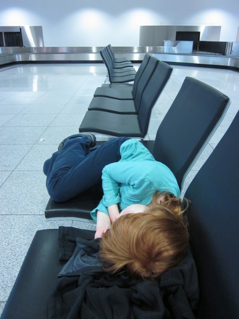 clo asleep in baggage claim