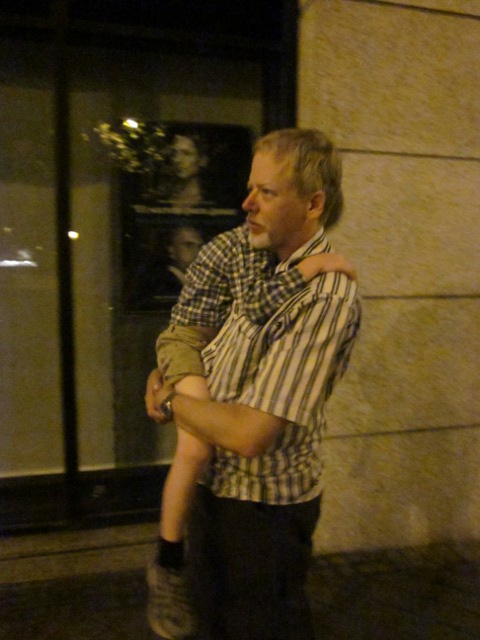 Vernon carrying a sleeping Eero