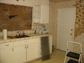 Day 2 - window gone, wallpaper partially removed